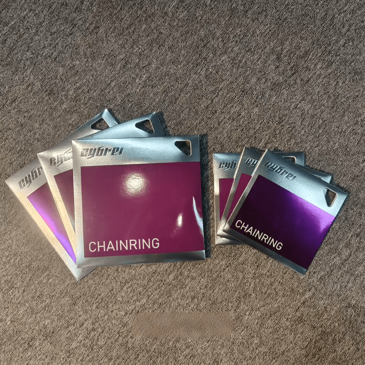 Detail of carbon crankset arms, spider interface, and aero 2x chainrings